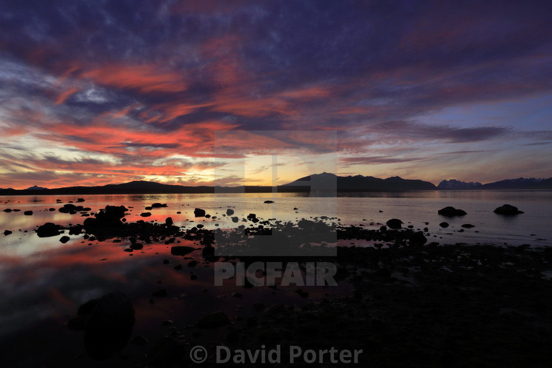 "Sunset over the Gulf of Admiral Montt, Puerto Natales city, Patagonia, Chile,..." by David Porter - $25.13 "Sunset over the Gulf of Admiral Montt, Puerto Natales city, Patagonia, Chile,..." stock image