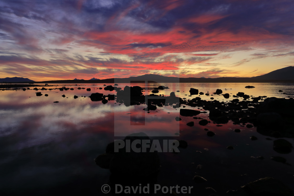 "Sunset over the Gulf of Admiral Montt, Puerto Natales city, Patagonia, Chile,..." by David Porter - $25.13 "Sunset over the Gulf of Admiral Montt, Puerto Natales city, Patagonia, Chile,..." stock image