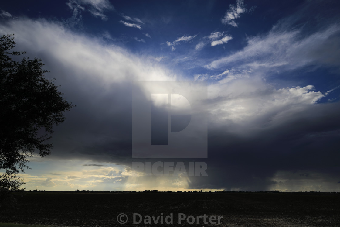 "Cumulonimbus Storm clouds over Fenland fields, near Wisbech town,..." stock image