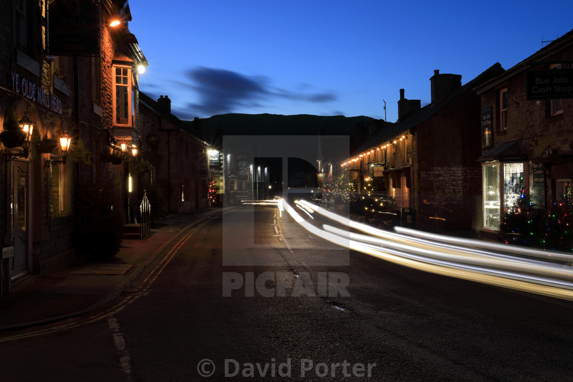 "Christmas Lights along Cross Street, Castleton village, Derbyshire, Peak..." stock image