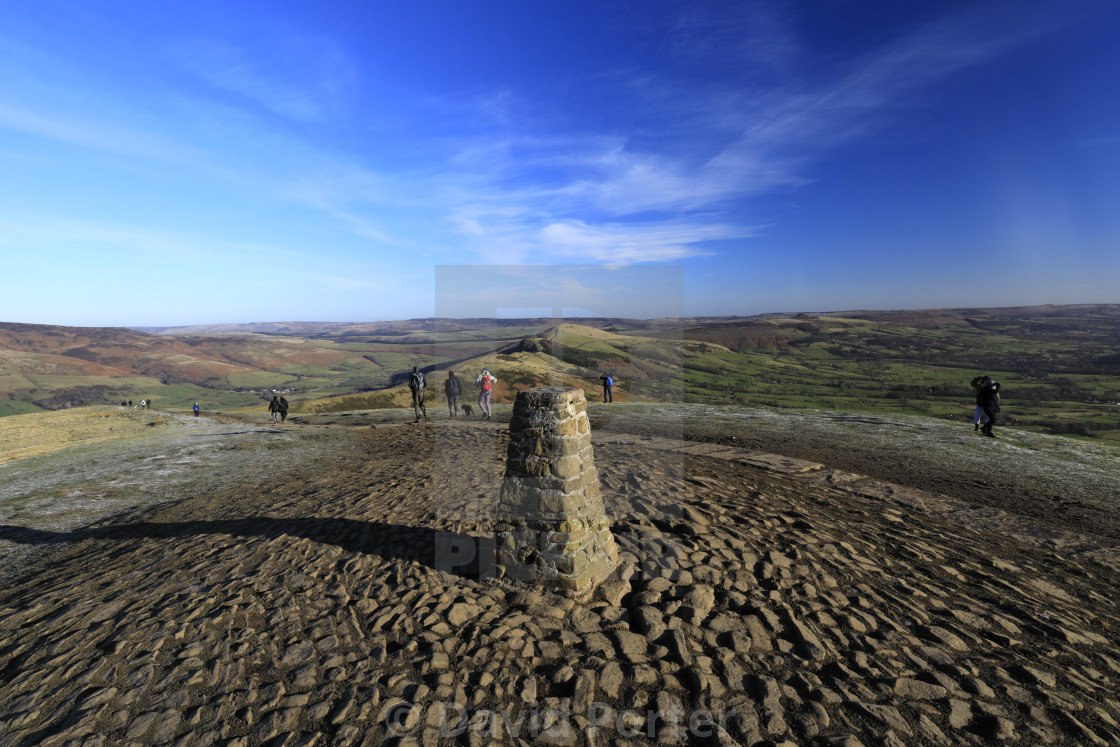 "Walkers at Mam Tor summit cairn, Vale of Castleton, Derbyshire, Peak District..." stock image