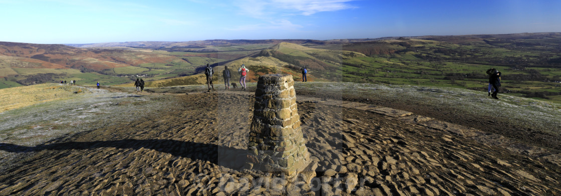 "Walkers at Mam Tor summit cairn, Vale of Castleton, Derbyshire, Peak District..." stock image