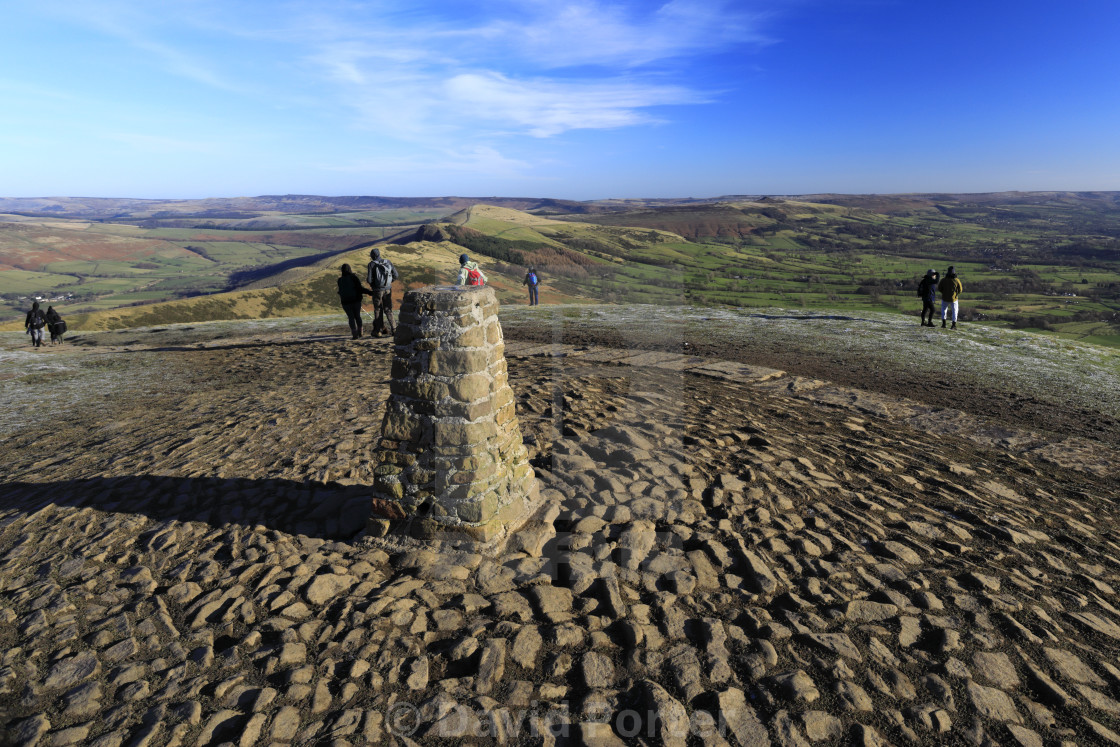 "Walkers at Mam Tor summit cairn, Vale of Castleton, Derbyshire, Peak District..." stock image