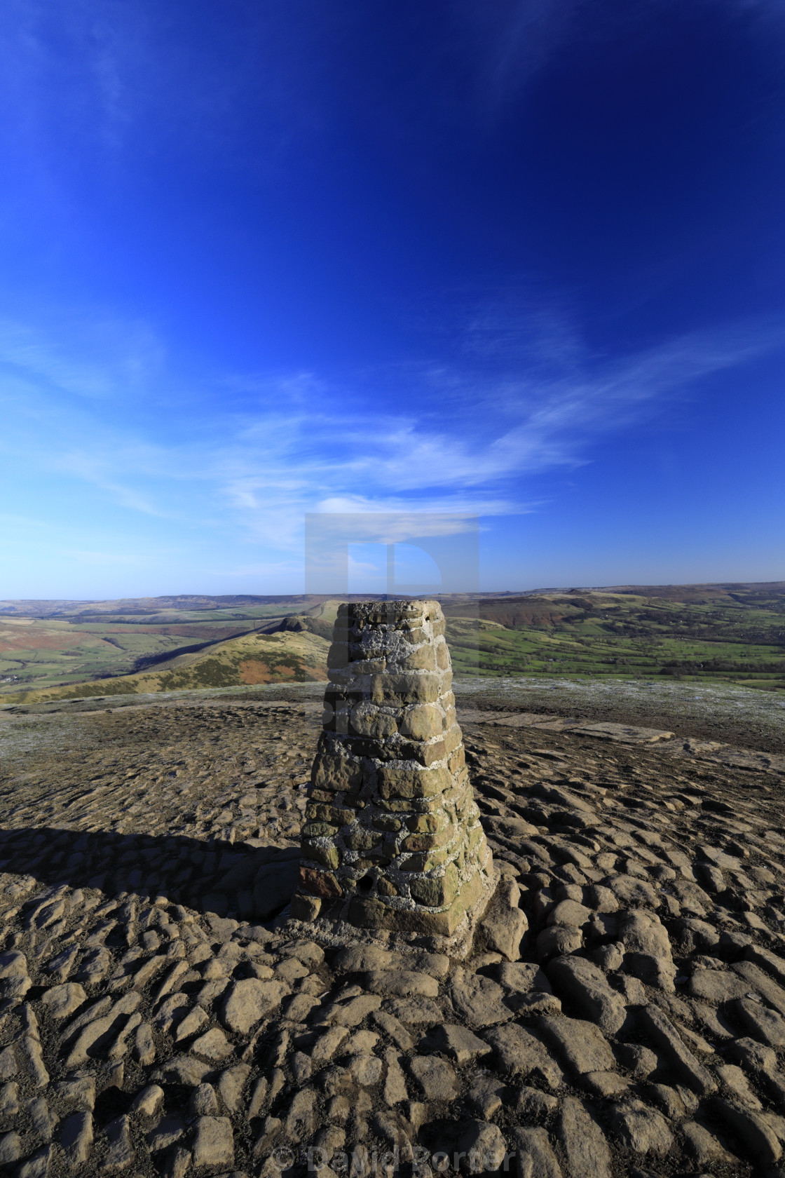 "Walkers at Mam Tor summit cairn, Vale of Castleton, Derbyshire, Peak District..." stock image