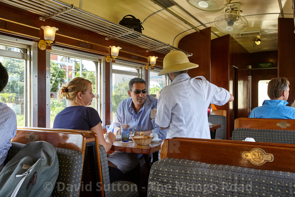 "Guests being served on the North Borneo Railway at Tanjung Art, Sabah, Malaysia" stock image