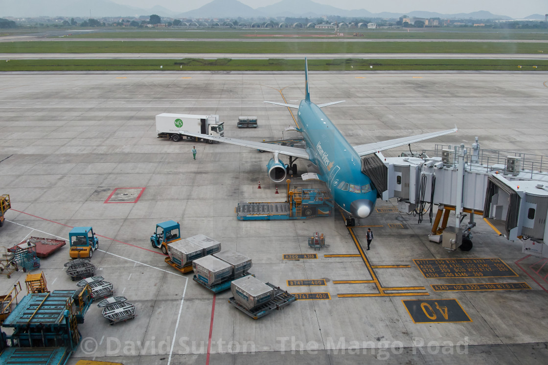 "Vietnam airlines jet at the gate at Noi Bai International Airport, Hanoi,..." stock image