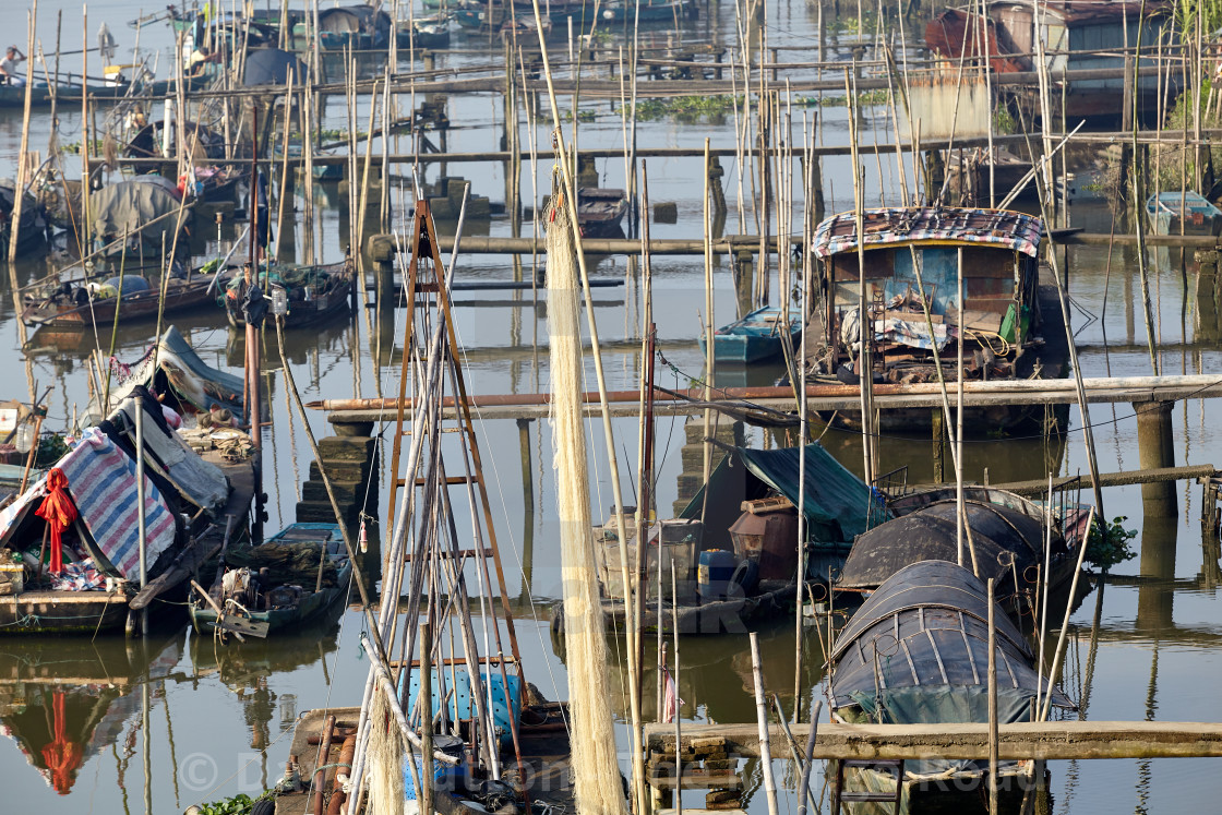 "Small boats and jetties on the Tanjiang River" stock image