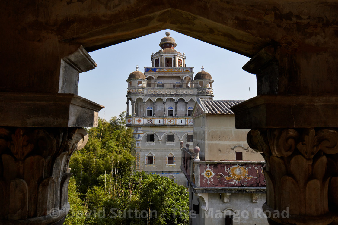 "Riushi Lou towers over Jinjiangli village." stock image