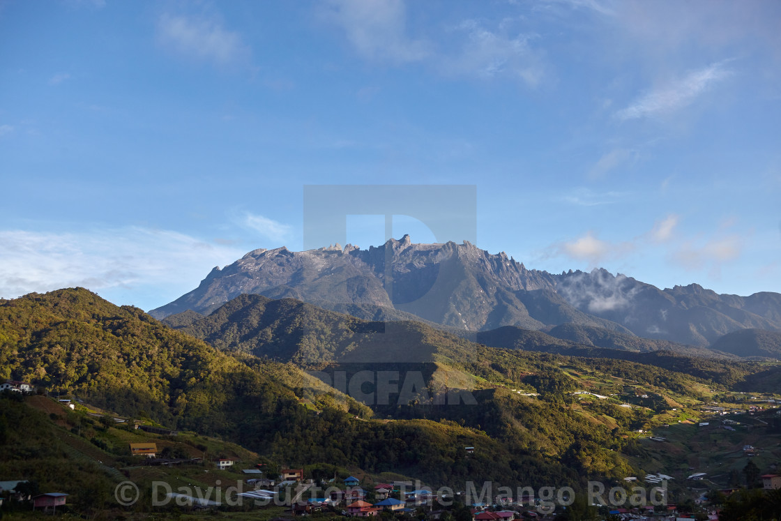 "Mount Kinabalu with the village of Kundesang in the foreground, Sabah,..." stock image