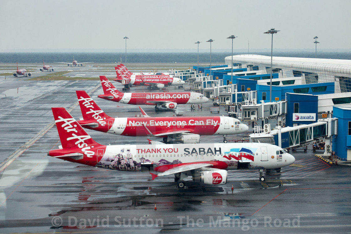 "Air Asia aircraft lined up waiting to depart at Kuala Lumpur International..." stock image