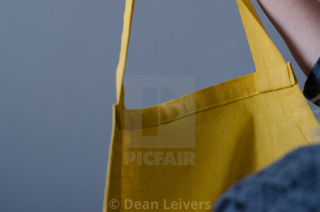 "Fabric Apron against plain background" stock image