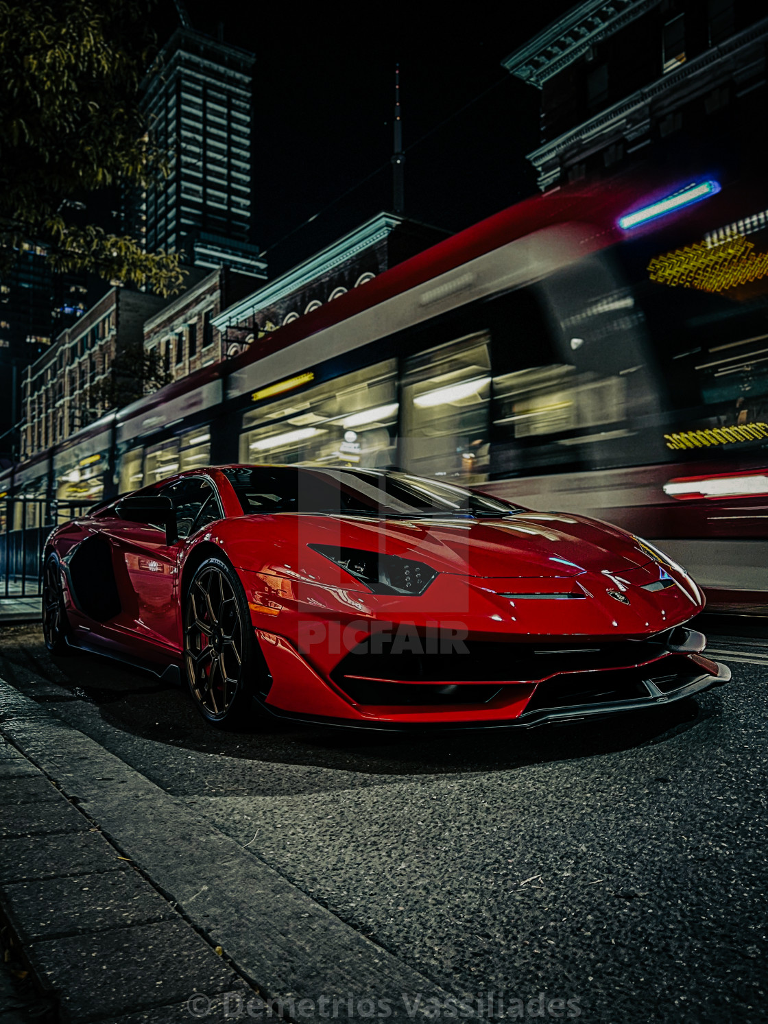 "Lamborghini Aventador SVJ on King St West with Tram" stock image