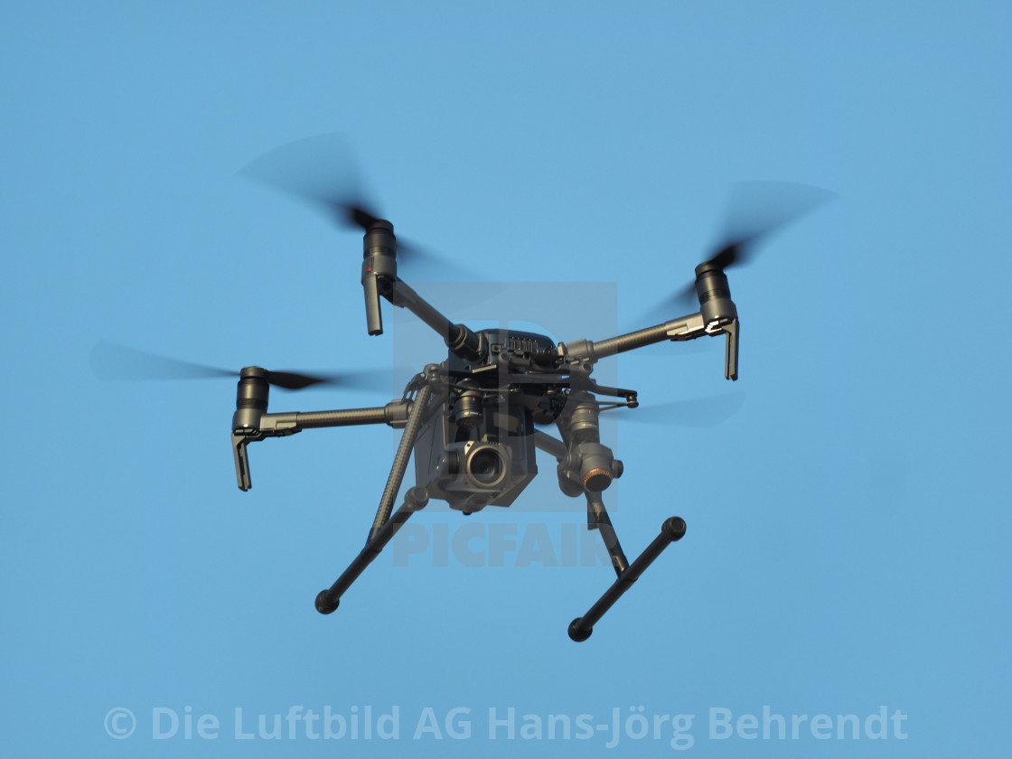 "Drohne in der Luft DJI M210 Aerial Drones" by Die Luftbild AG Hans-Jörg Behrendt - $1.55 "Drohne in der Luft DJI M210 Aerial Drones" stock image