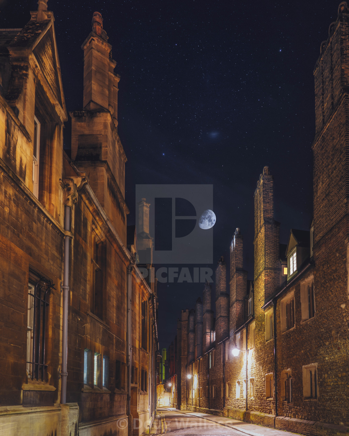 "Moonset on Trinity Lane, Cambridge UK." stock image