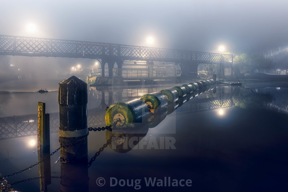 "A foggy Jesus Lock footbridge, Cambridge UK." stock image