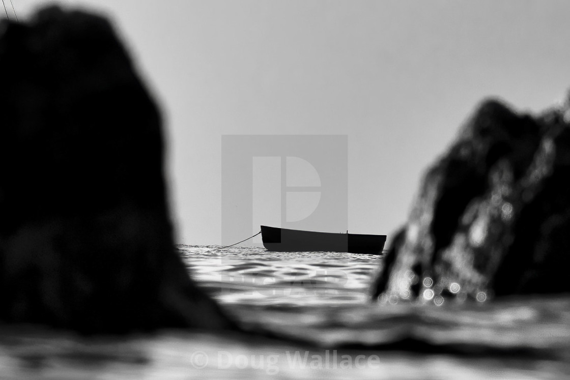 "A lone boat from Cawsand Bay, Cornwall UK." stock image