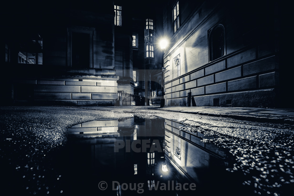 "Black and White night reflections from Trinity Lane, Cambridge UK." stock image