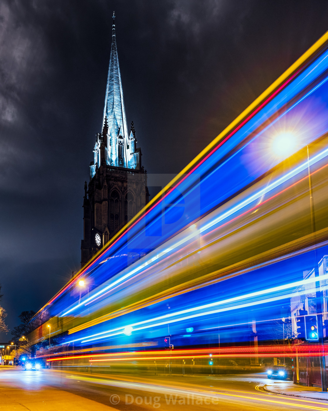 "Bus light trails from Regent Street, Cambridge UK." stock image