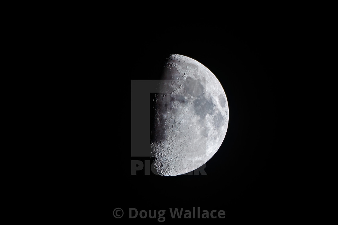 "Waxing Gibbous Moon, 62% visible." stock image