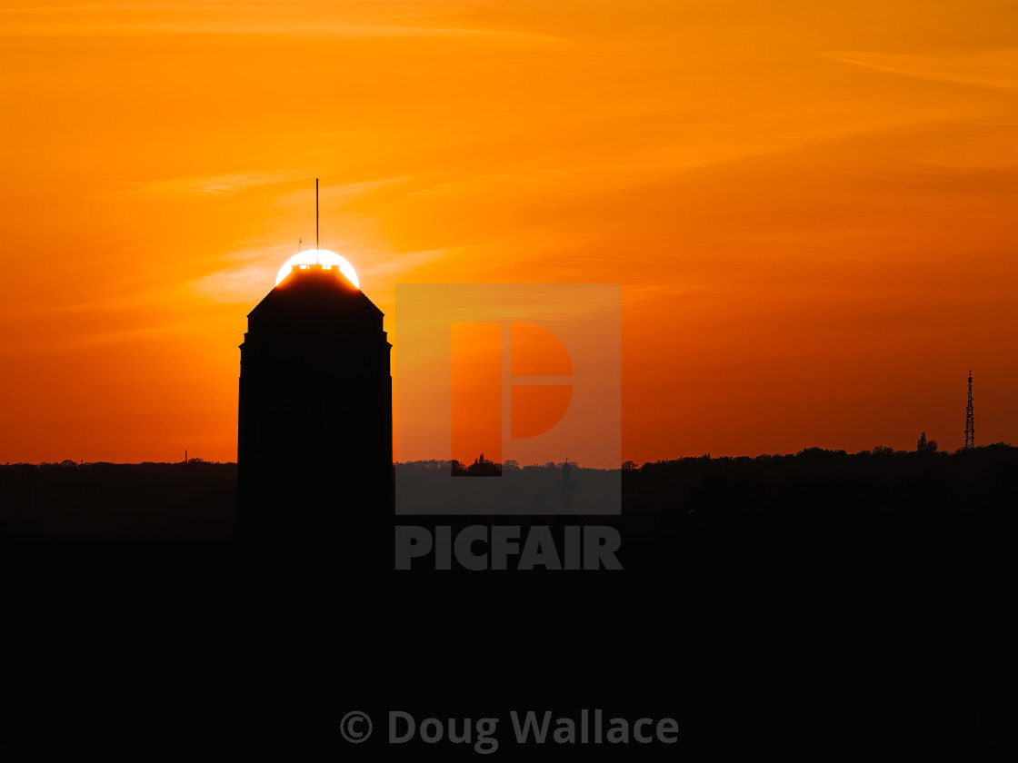 "Sun setting behind Cambridge University Library, Cambridge UK." stock image