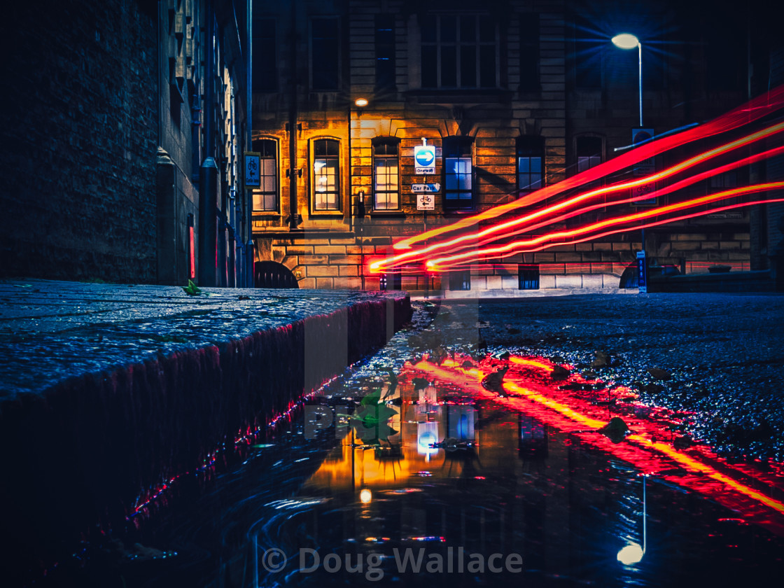 "Light Trail Reflections from Tennison Court Road, Cambridge UK." stock image