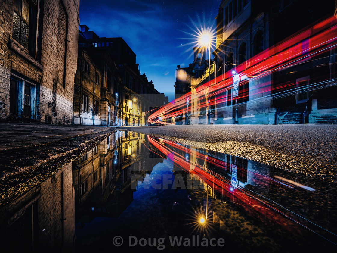 "Light trails and reflections from Pembroke Street, Cambridge UK." stock image