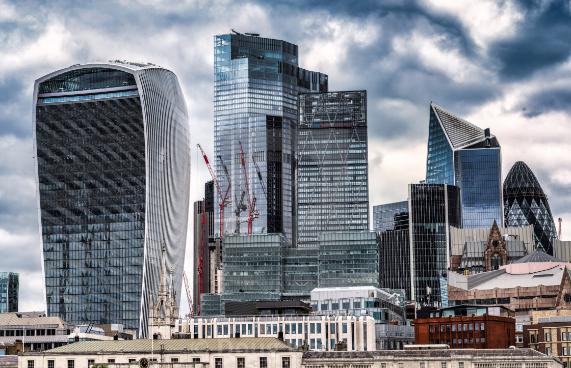 "Skyscrapers along The River Thames, London UK." stock image