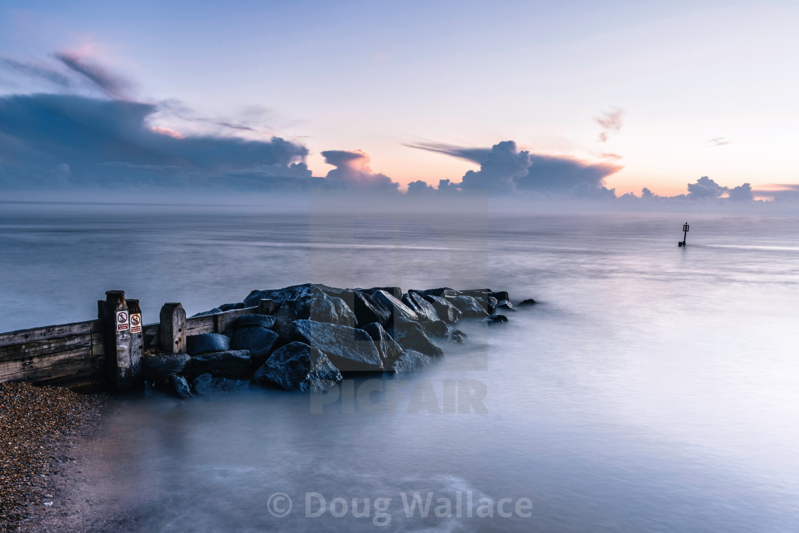 "Sunrise from Southwold beach, Suffolk UK." stock image