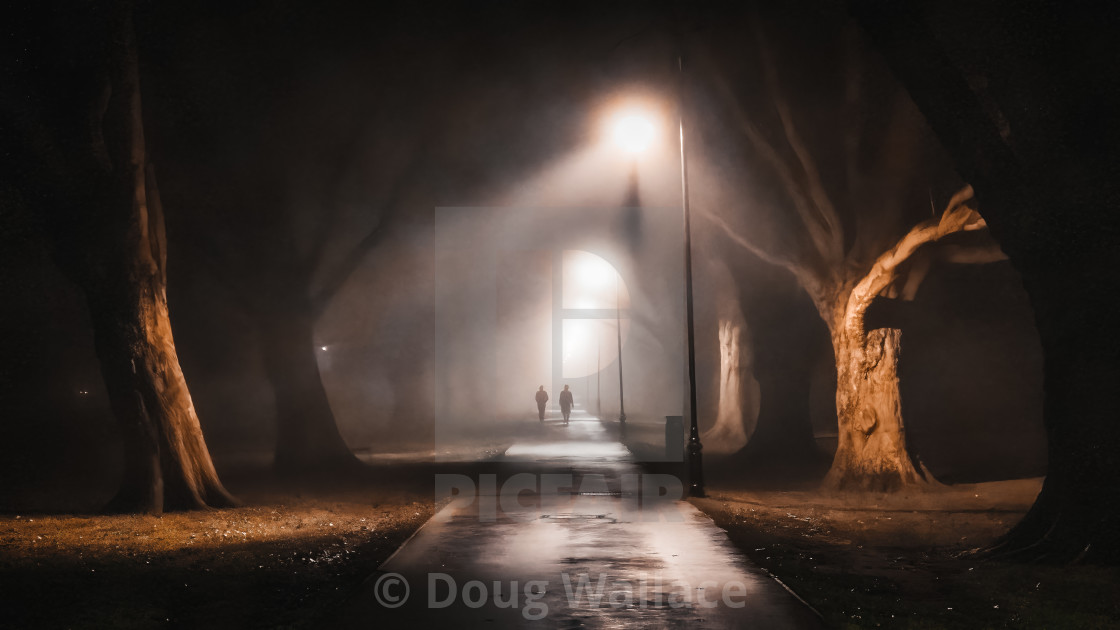 "A foggy evening walk, Jesus Green, Cambridge UK." stock image