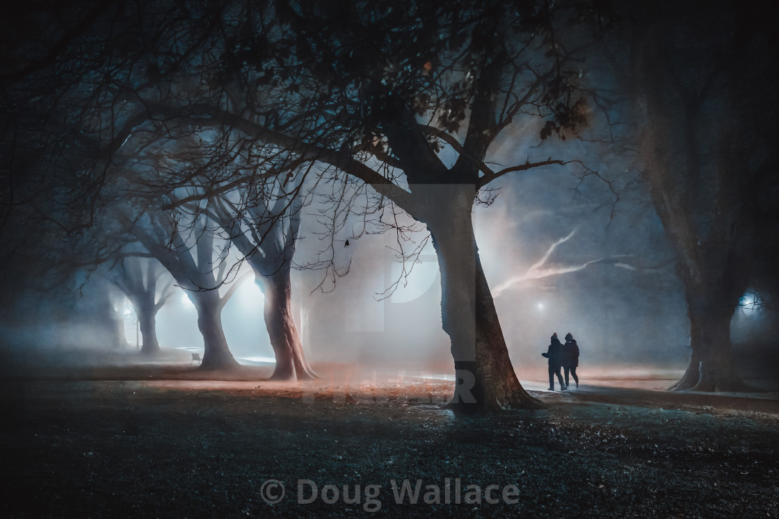 "A foggy evening walk, Jesus Green, Cambridge UK." stock image