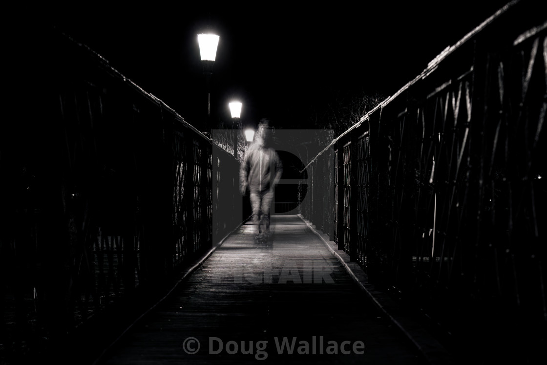 "A night time stroll over Jesus Lock Bridge, Cambridge UK." stock image