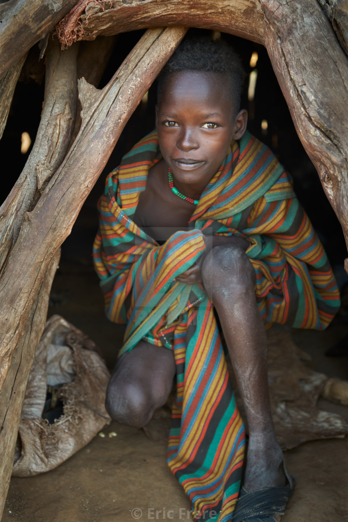 "Hamer tribe boy at home" by Eric Frere - $40.35 "Hamer tribe boy at home" stock image