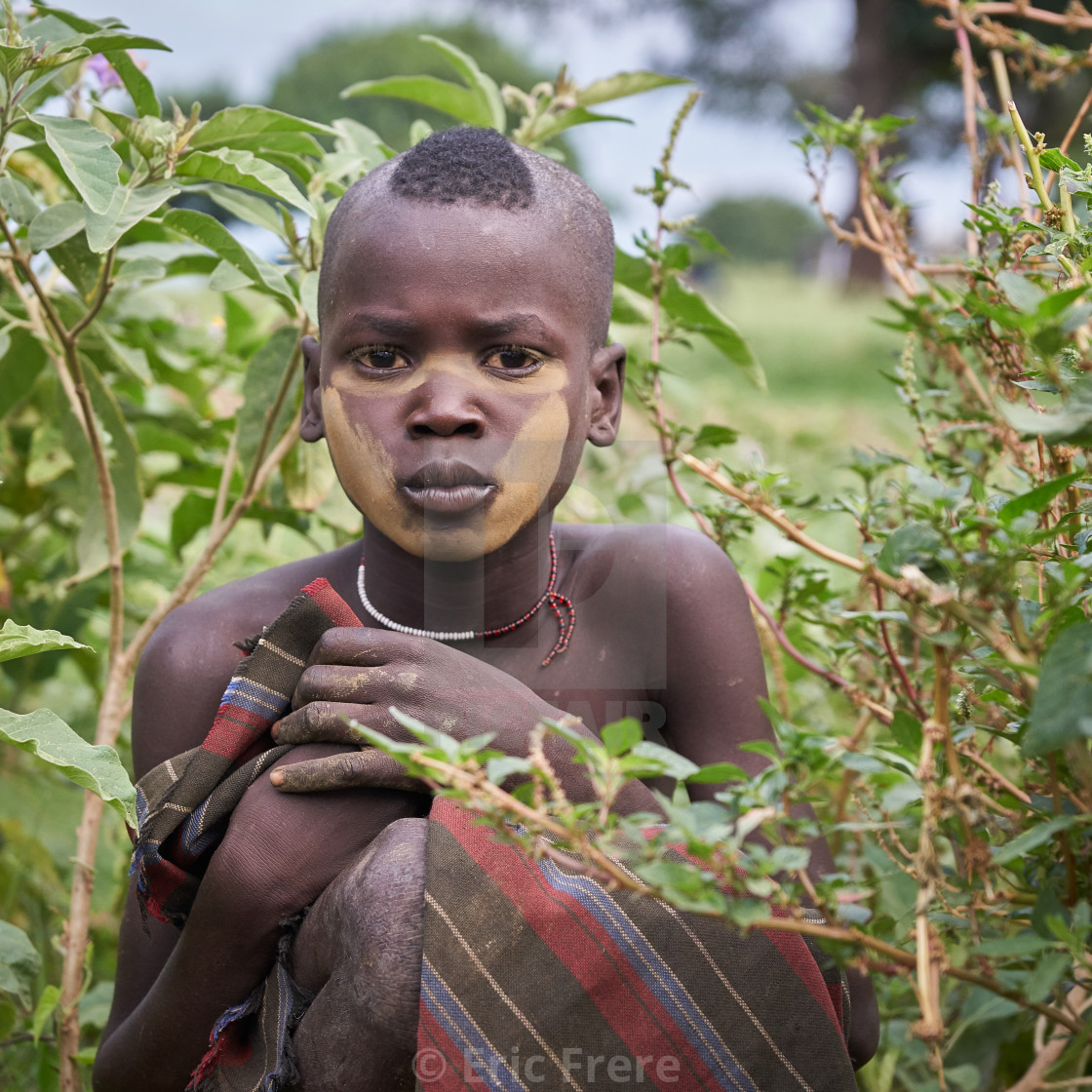 "Mursi boy" by Eric Frere - $40.35 "Mursi boy" stock image