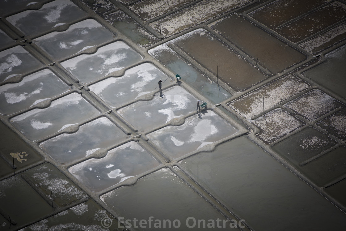 "saltfarmers @work" by Estefano Onatrac - $12.35 "saltfarmers @work" stock image