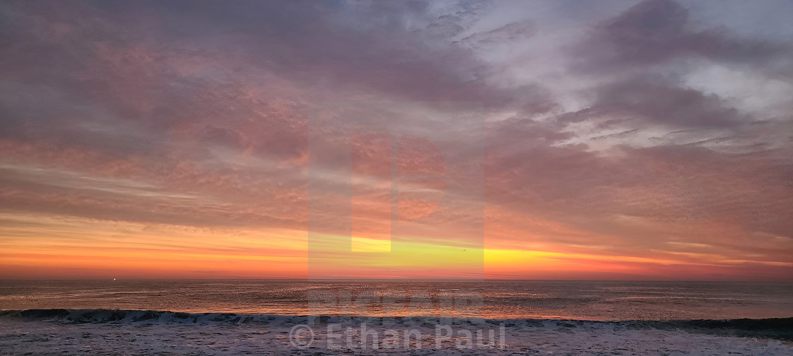 "Dawn Sky Over the Ocean" stock image