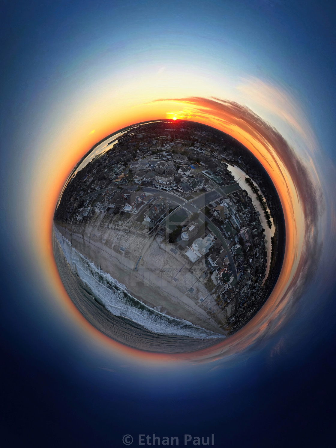 "Winter Sunset Off the Beach Tiny Planet" stock image