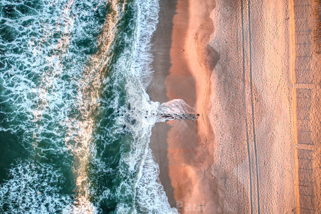 "Sunrise Waves Crashing on Jetty 1" stock image