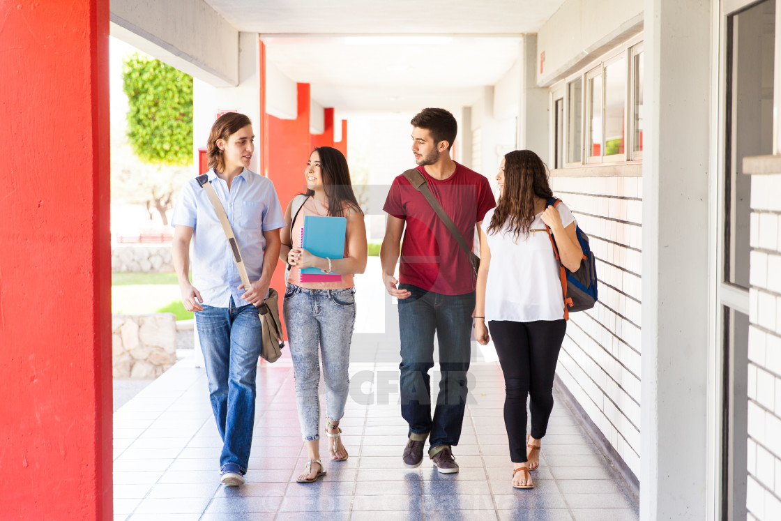 "College students walking together" by Foto Creativa - £3.80 "College students walking together" stock image