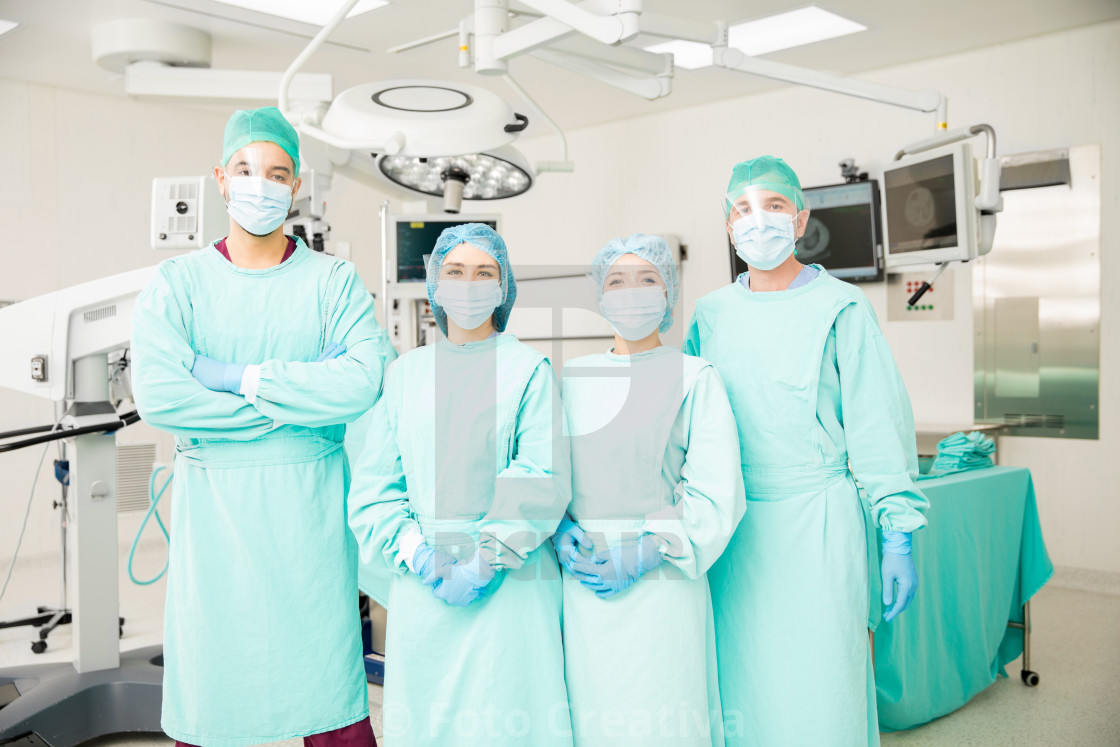 "Group of surgeons in an OR" by Foto Creativa - £3.80 "Group of surgeons in an OR" stock image