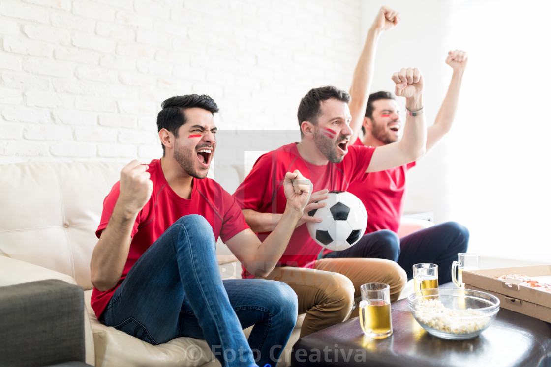 "Fans On Cloud Nine As Their Team Wins The Match" by Foto Creativa - £3.80 "Fans On Cloud Nine As Their Team Wins The Match" stock image