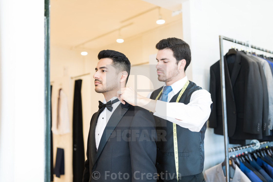 "Clerk Providing Best Customer Service" by Foto Creativa - £3.80 "Clerk Providing Best Customer Service" stock image
