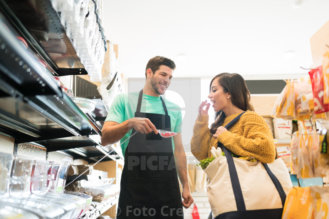 "Female Customer Shopping In Supermarket" by Foto Creativa - £3.80 "Female Customer Shopping In Supermarket" stock image