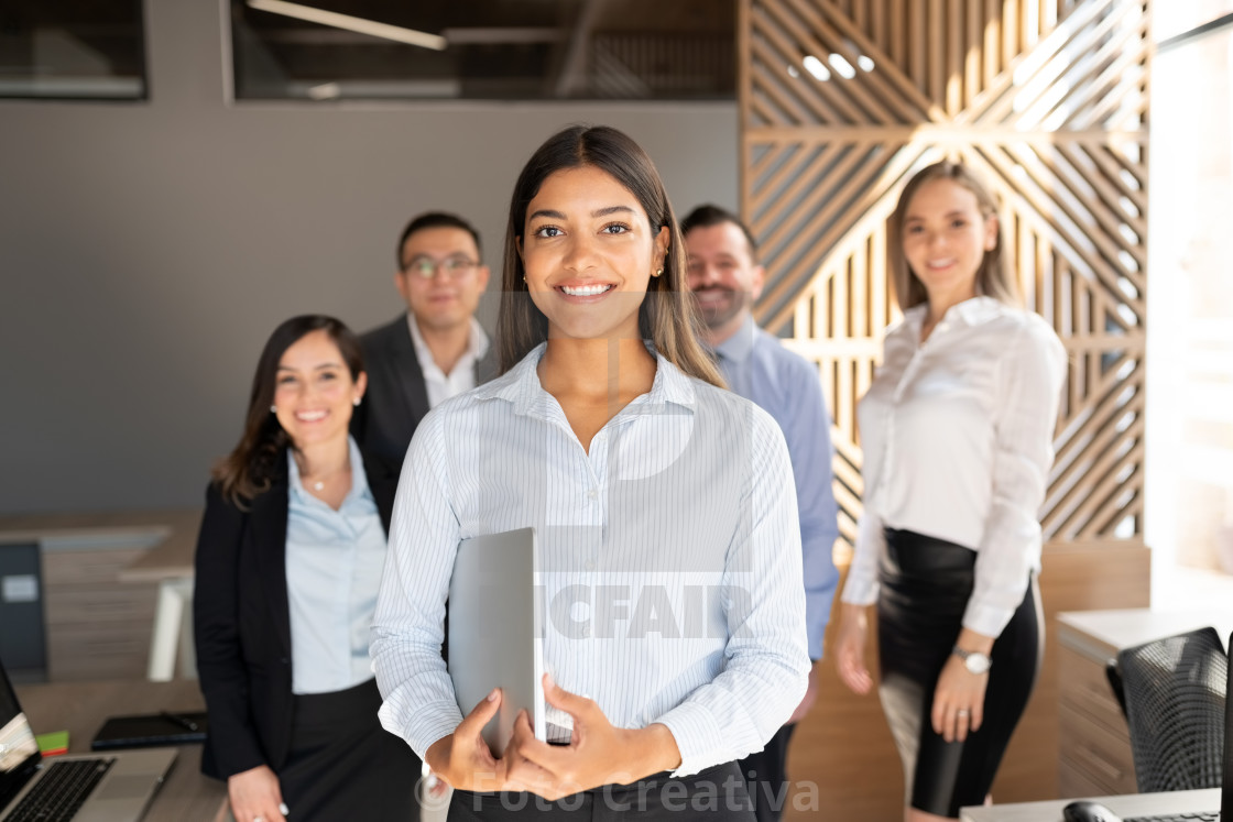 "Confident hispanic business woman in office" by Foto Creativa - £3.80 "Confident hispanic business woman in office" stock image