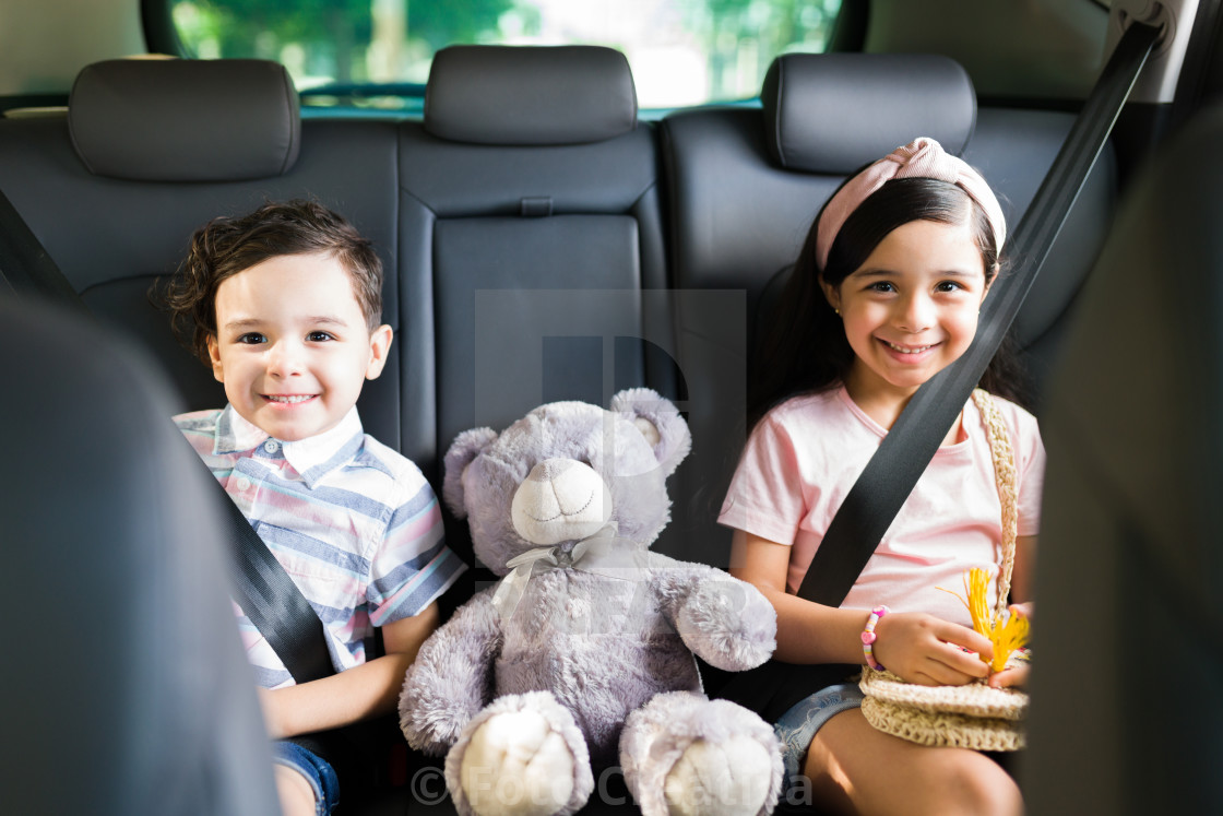 "Adorable brother and sister waiting in the car" by Foto Creativa - £3.80 "Adorable brother and sister waiting in the car" stock image