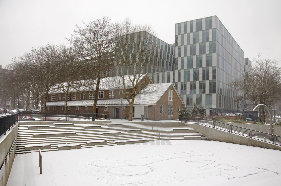 "Church and offices during snowstorm" by Frans Blok - $15.41 "Church and offices during snowstorm" stock image
