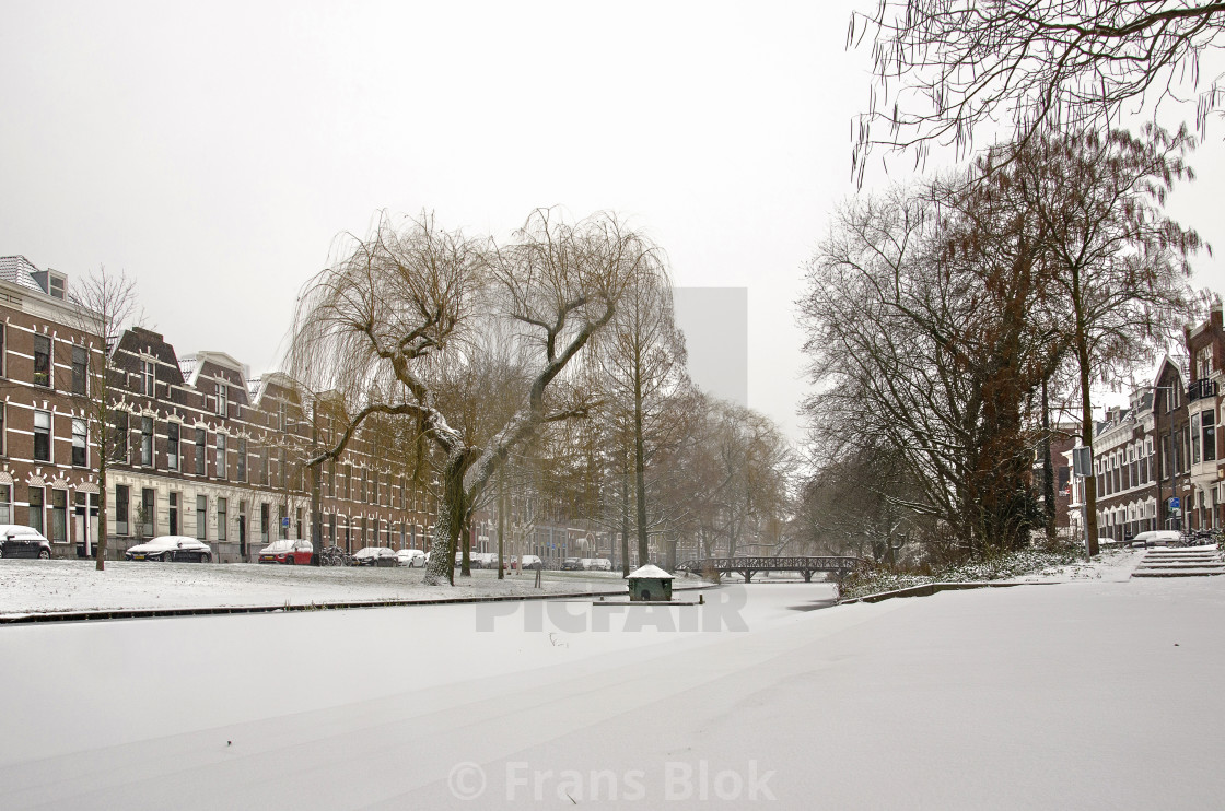 "Snow-covered canal in Rotterdam" by Frans Blok - $15.41 "Snow-covered canal in Rotterdam" stock image