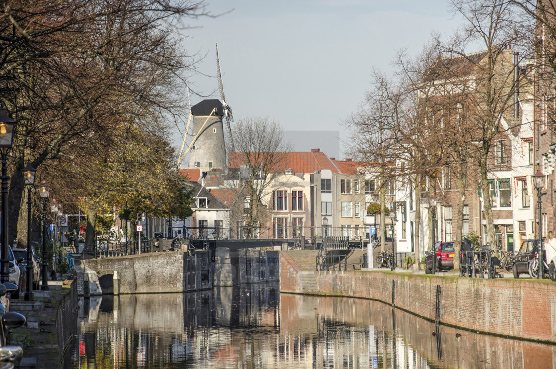 "Schiedam canal, sluice and windmill" by Frans Blok - $15.41 "Schiedam canal, sluice and windmill" stock image