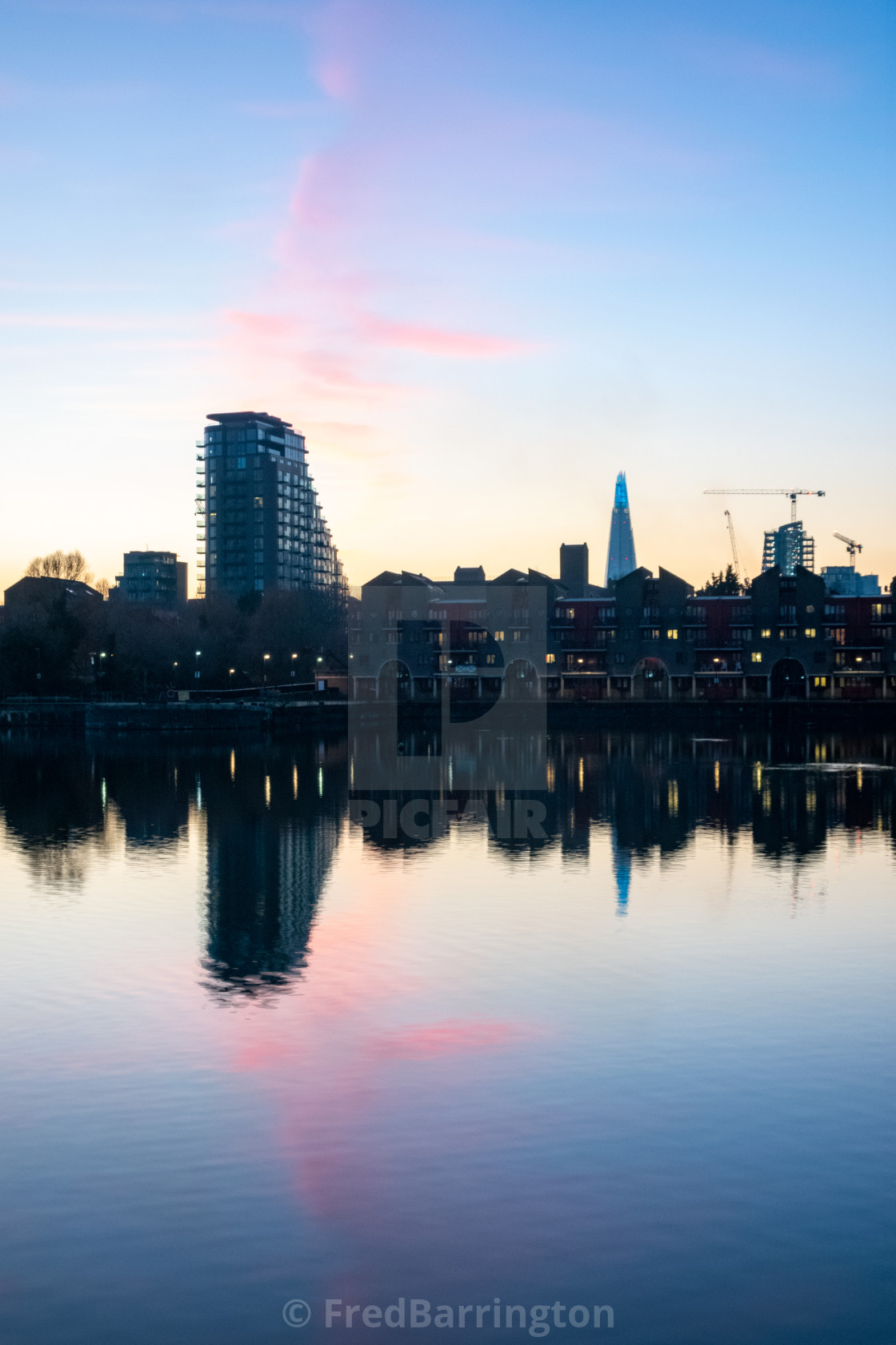 "Sun setting over the City from Shadwell Basin" stock image