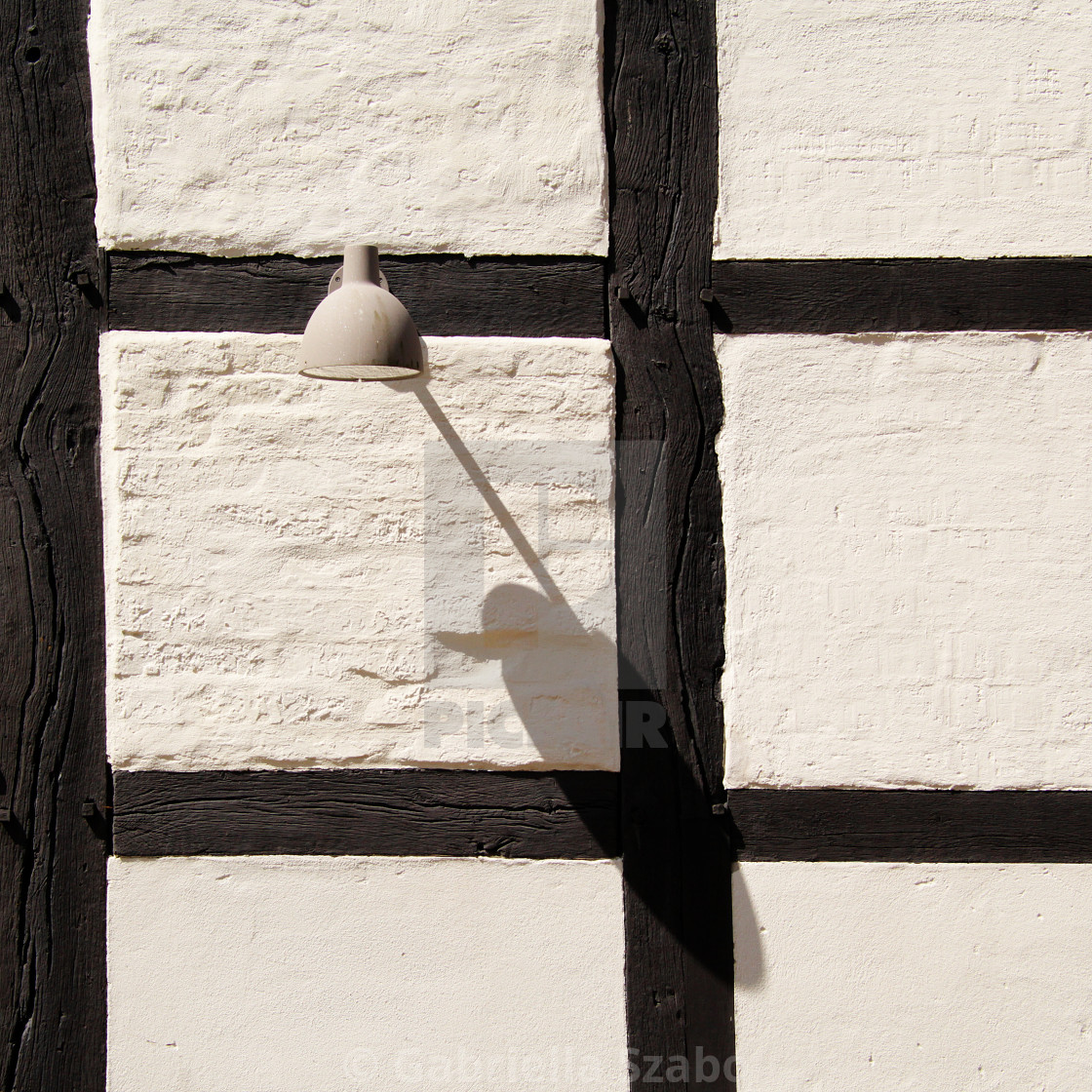 "a lamp on the wall" stock image