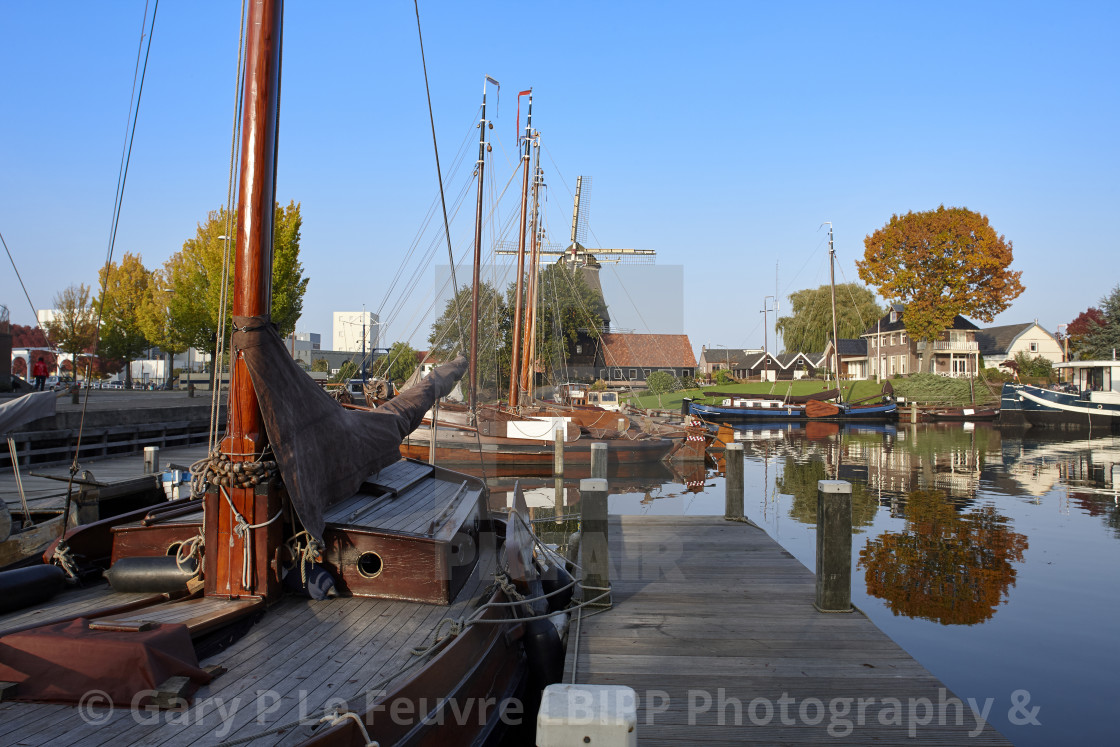 "Dutch Sailing boats with windmill" stock image